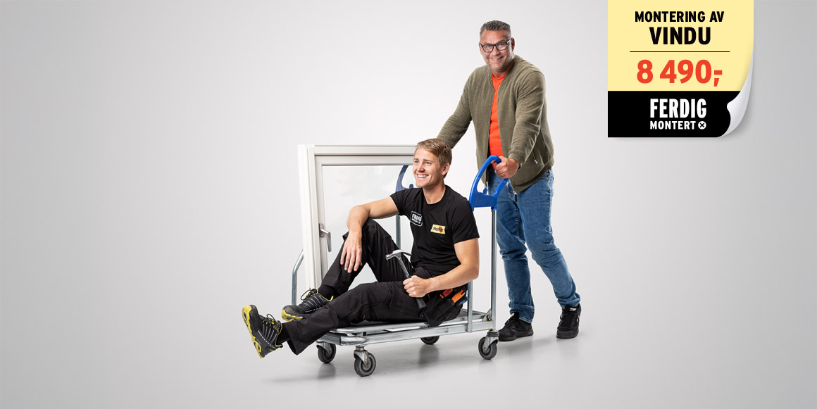 Bilde av snekker med vindu klar for å levere ferdig montert fra Montér