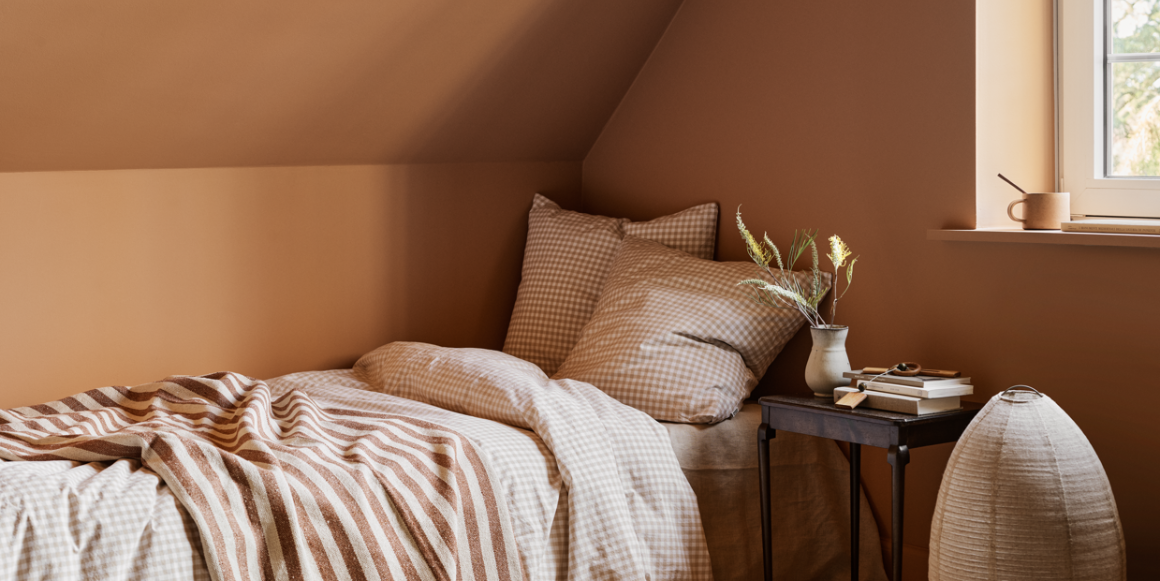 Soverom i den oransje fargen Orche Clay fra Jotun sitt nye fargekart