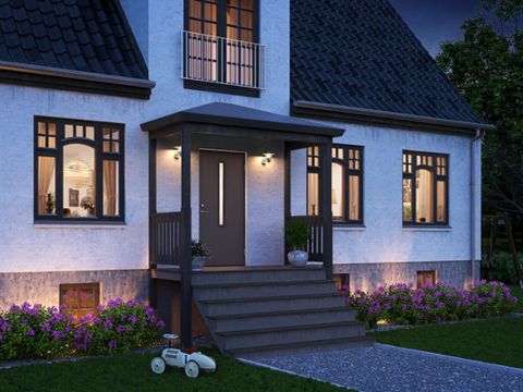hus med takrenner som er malt med eksteriørmaling hus med takrenner som er malt med eksteriørmaling